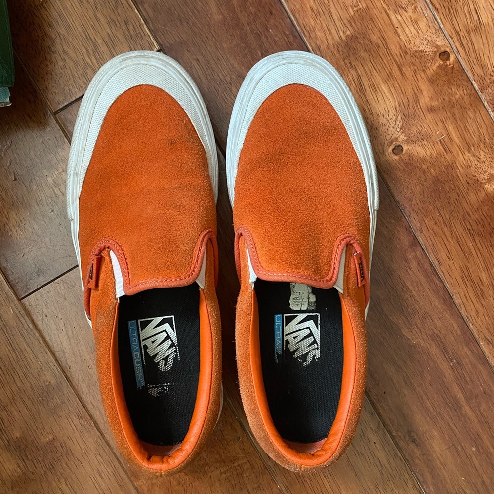 Orange slip on vans
